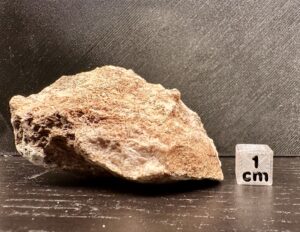 Albite with Tugtupite (possibly xx), Aegirine and Beryllite + Bertrandite (alteration after Tugtupite)